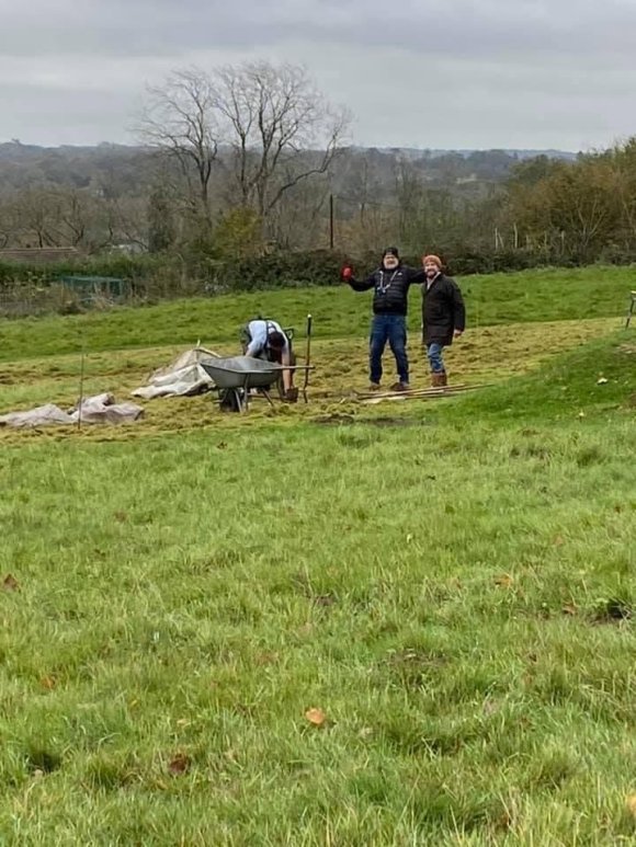 Photo of  residents preparing ground in Finche Field for the Community Orchard